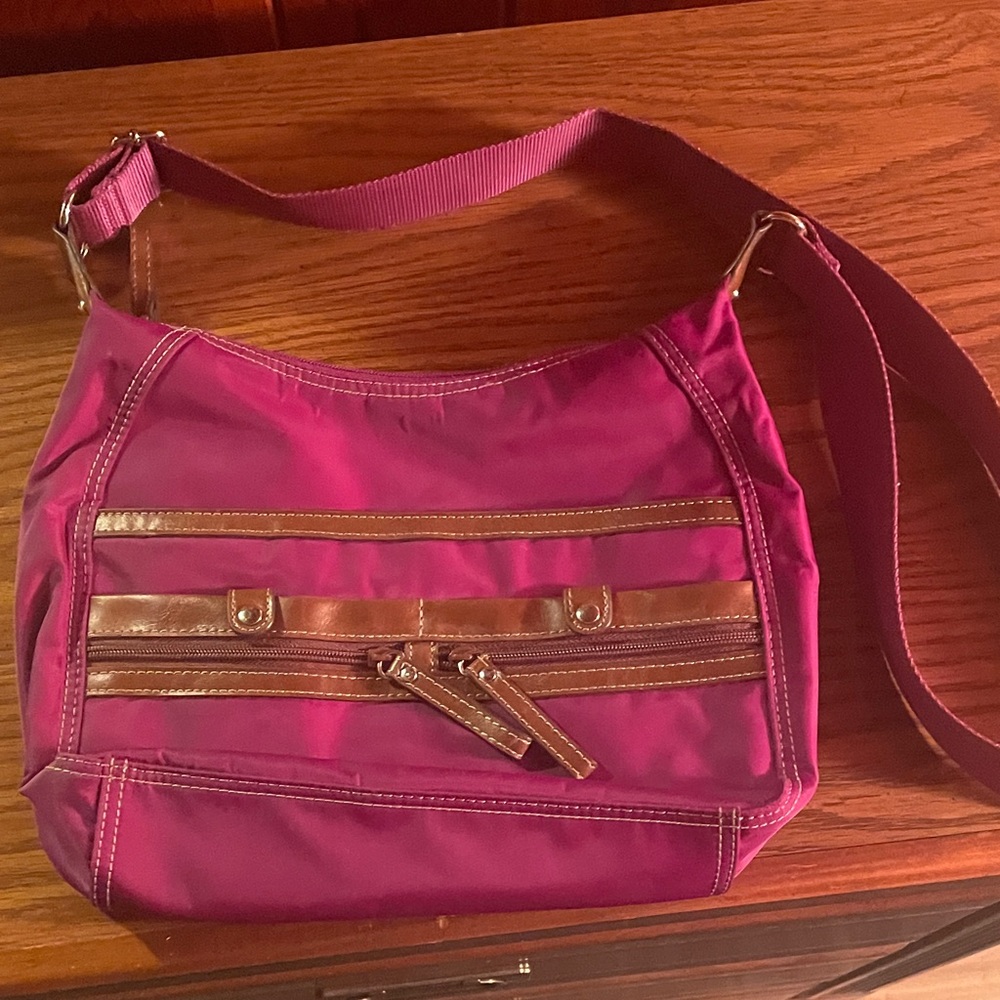 Nine W. Crossbody in magenta, great condition.